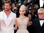 (From L) Chris Hemsworth, Anya Taylor-Joy and George Miller arrive for the screening of the film Furiosa: A Mad Max Saga at the 77th Cannes Film Festival. (Photo by Valery HACHE / AFP) (From L) Chris Hemsworth, Anya Taylor-Joy and George Miller arrive for the screening of the film Furiosa: A Mad Max Saga at the 77th Cannes Film Festival. (Photo by Valery HACHE / AFP)