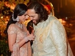Radhika Merchant and Anant Ambani sharing a laughter-filled moment. 