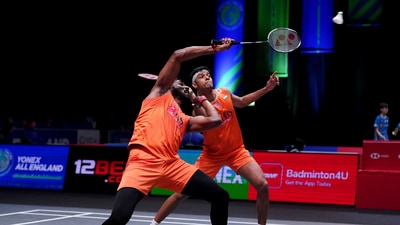 India's Chirag Shetty, background, and India's Satwiksairaj Rankireddy in action (AP)