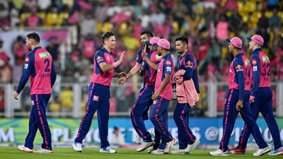 Rajasthan Royals' Trent Boult (2L) celebrates with teammates after taking the wicket of Punjab Kings' Prabhsimran Singh (not pictured) during the Indian Premier League (IPL) (AFP) Rajasthan Royals' Trent Boult (2L) celebrates with teammates after taking the wicket of Punjab Kings' Prabhsimran Singh (not pictured) during the Indian Premier League (IPL) (AFP)