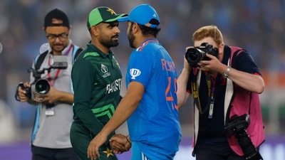 Pakistan's Babar Azam shakes hands with India's Rohit Sharma. (REUTERS)