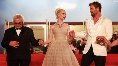 Australian actor Chris Hemsworth (right), British-US actor Anya Taylor-Joy (centre) and Australian director and screenwriter George Miller pose after the screening of the film Furiosa: A Mad Max Saga at the 77th edition of the Cannes Film Festival in Cannes, southern France, on May 15, 2024. (AFP) Australian actor Chris Hemsworth (right), British-US actor Anya Taylor-Joy (centre) and Australian director and screenwriter George Miller pose after the screening of the film Furiosa: A Mad Max Saga at the 77th edition of the Cannes Film Festival in Cannes, southern France, on May 15, 2024. (AFP)