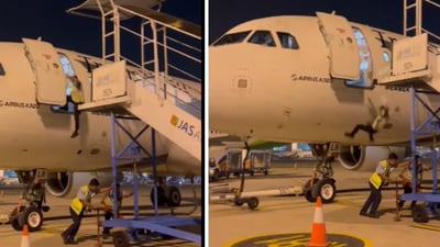 The ground staff fell off the plane at an airport in Indonesia. (X/@sjlazars) The ground staff fell off the plane at an airport in Indonesia. (X/@sjlazars)