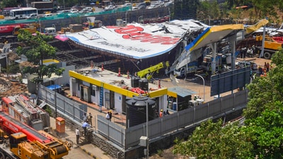 Rescue and relief work underway near the site of the hoarding collapse at Ghatkopar (PTI) Rescue and relief work underway near the site of the hoarding collapse at Ghatkopar (PTI)