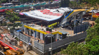 Rescue and relief work underway near the site of the hoarding collapse at Ghatkopar. (PTI) Rescue and relief work underway near the site of the hoarding collapse at Ghatkopar. (PTI)