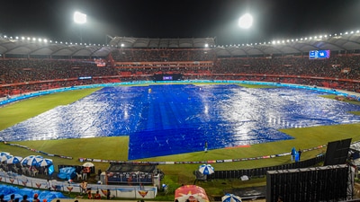 Covers on the ground at the Rajiv Gandhi International Stadium as rain delays an Indian Premier League (IPL) 2024 T20 cricket match between Sunrisers Hyderabad (SRH) and Gujarat Titans (GT) (PTI) Covers on the ground at the Rajiv Gandhi International Stadium as rain delays an Indian Premier League (IPL) 2024 T20 cricket match between Sunrisers Hyderabad (SRH) and Gujarat Titans (GT) (PTI)