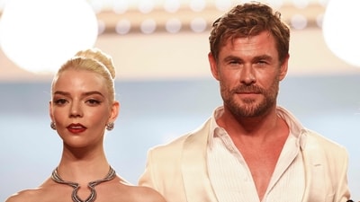 Anya Taylor-Joy's costar Chris Hemsworth also turned heads with his ensemble. The Australian actor paired his black trousers and white jacket and shirt as he hit the red carpet for Furiosa: A Mad Max Saga's Cannes premiere. In a daring move, he went sans tie, technically breaking the Cannes dress code. (AFP) Anya Taylor-Joy's costar Chris Hemsworth also turned heads with his ensemble. The Australian actor paired his black trousers and white jacket and shirt as he hit the red carpet for Furiosa: A Mad Max Saga's Cannes premiere. In a daring move, he went sans tie, technically breaking the Cannes dress code. (AFP)