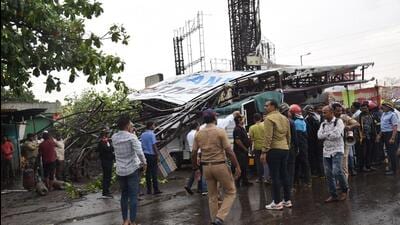 The 20x40 feet hoarding, located on the margin of the road at Jai Ganesh Samrajya Chowk in Moshi, collapsed due to strong winds and rain on a parked tempo and two two-wheelers at around 4.30 pm. (HT PHOTO)