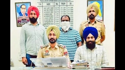 The accused in police custody on Thursday in Ludhiana. (HT photo)