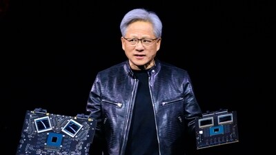 Nvidia's CEO Jensen Huang displays products on-stage during the annual Nvidia GTC Artificial Intelligence Conference at SAP Center in San Jose, California. (AFP)
