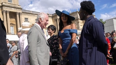 King Charles speaks with Maya Jama and Campbell Addy. (YUI MOK/PA WIRE) King Charles speaks with Maya Jama and Campbell Addy. (YUI MOK/PA WIRE)