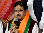 Former Calcutta high court Judge Abhijit Gangopadhyay (M) joined Bharatiya Janata Party (BJP) in March. Former Calcutta high court Judge Abhijit Gangopadhyay (M) joined Bharatiya Janata Party (BJP) in March.
