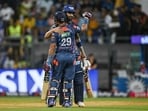 Lucknow Super Giants' Nicholas Pooran (L) is congratulated by captain KL Rahul after scoring a half-century (50 runs) during the Indian Premier League (IPL) Twenty20 cricket match between Mumbai Indians and Lucknow Super Giants Lucknow Super Giants' Nicholas Pooran (L) is congratulated by captain KL Rahul after scoring a half-century (50 runs) during the Indian Premier League (IPL) Twenty20 cricket match between Mumbai Indians and Lucknow Super Giants