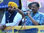 Aam Aadmi Party (AAP) leader Arvind Kejriwal (R) and Punjab's chief minister Bhagwant Mann (L) .