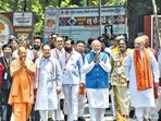 Prime Minister Narendra Modi accompanied by Union home minister Amit Shah and Uttar Pradesh chief minister Yogi Adityanath in Varanasi. (ANI Photo)