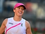 Poland's Iga Swiatek celebrates after winning against USA's Coco Gauff at the Women's WTA Rome Open
