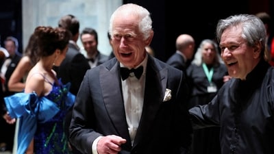 Queen Camilla, who claims her top priority right now is the King's health, revealed during a royal engagement that he is "getting better". She joked, "Well, he would be [getting better] if he behaved himself." (AFP)