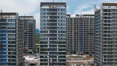 Residential buildings under construction by Chinese real estate developer Vanke in Hangzhou, in eastern China's Zhejiang province. (AFP) Residential buildings under construction by Chinese real estate developer Vanke in Hangzhou, in eastern China's Zhejiang province. (AFP)