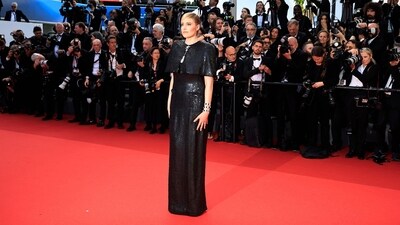 US director and President of the Jury at the 77th Cannes Film Festival Greta Gerwig arrived for the screening of her film 'Megalopolis' and she certainly stunned on the red carpet. The Barbie director wore a black shimmering gown paired with a star-shaped diamond brooch and a quirky layered bracelet on her wrist to round off her dazzling look. (Photo by Valery HACHE / AFP) US director and President of the Jury at the 77th Cannes Film Festival Greta Gerwig arrived for the screening of her film 'Megalopolis' and she certainly stunned on the red carpet. The Barbie director wore a black shimmering gown paired with a star-shaped diamond brooch and a quirky layered bracelet on her wrist to round off her dazzling look. (Photo by Valery HACHE / AFP)