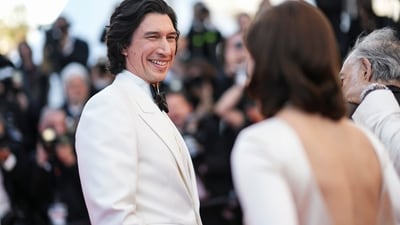 Adam Driver captivated the red carpet, making a grand entrance in a striking white tuxedo paired with a black bowtie. With his charming smile and sleek swept-back hair, he exuded dash and is guaranteed to steal hearts. (Scott A Garfitt/Invision/AP) Adam Driver captivated the red carpet, making a grand entrance in a striking white tuxedo paired with a black bowtie. With his charming smile and sleek swept-back hair, he exuded dash and is guaranteed to steal hearts. (Scott A Garfitt/Invision/AP)