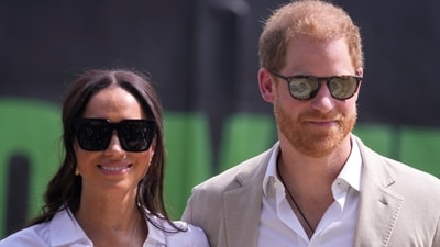 Prince Harry, right, and Meghan, left, attend the Giant of Africa Foundation at the Dream Big Basketball clinic in Lagos Nigeria, Sunday, May 12, 2024. (AP)