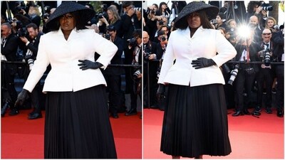 The French singer Yseult stunned on the Cannes red carpet in elegant Dior Haute Couture white silk jacket, which was tailored to perfection and presented a stylish silhouette, worn over a black silk pleated skirt. With black gloves and a large back hat, she set style standards. (Ap photo) The French singer Yseult stunned on the Cannes red carpet in elegant Dior Haute Couture white silk jacket, which was tailored to perfection and presented a stylish silhouette, worn over a black silk pleated skirt. With black gloves and a large back hat, she set style standards. (Ap photo)