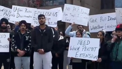 Hundreds of Indian students in Canada protest against government for changing policy overnight and deny them work permits. Hundreds of Indian students in Canada protest against government for changing policy overnight and deny them work permits.