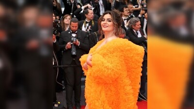 The 33-year-old actor wore a dramatic tangerine off-shoulder gown from the shelves of designer Aanchal Dey. (Instagram/@iamdeeptisadhwani) The 33-year-old actor wore a dramatic tangerine off-shoulder gown from the shelves of designer Aanchal Dey. (Instagram/@iamdeeptisadhwani)