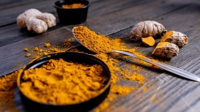 Curcumin helps in easing inflammation and boosting Serotonin and Dopamine. This helps in alleviating symptoms of Depression. (Karl Solano) Curcumin helps in easing inflammation and boosting Serotonin and Dopamine. This helps in alleviating symptoms of Depression. (Karl Solano)