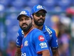 Mumbai Indians captain Hardik Pandya and his teammate Rohit Sharma during the Indian Premier League (IPL) T20 cricket match