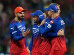Royal Challengers Bengaluru's captain Faf du Plessis, Virat Kohli and others celebrate after winning the Indian Premier League (IPL) 2024 T20 cricket match between Royal Challengers Bengaluru and Delhi Capitals