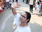West Bengal chief minister Mamata Banerjee leading a road show in Kanthi on Thursday. (HT file photo)