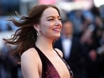 Emma sure looked stunning in her shimmery rust-coloured dress and her auburn hair flowing in the wind.&nbsp;(Scott A Garfitt/Invision/AP)