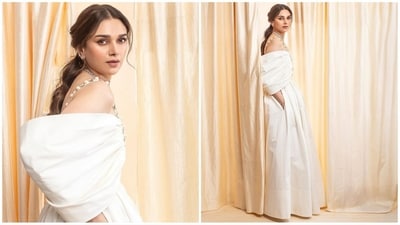 She styled her luscious tresses into soft curls and tied them into a low ponytail in the middle partition, leaving a section of her hair open at the front to beautifully frame her face. (Instagram/@aditiraohydari) She styled her luscious tresses into soft curls and tied them into a low ponytail in the middle partition, leaving a section of her hair open at the front to beautifully frame her face. (Instagram/@aditiraohydari)