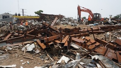 More than 70 vehicles, including cars, were retrieved from the wreckage at the site of a hoarding crash in Mumbai. (HT Photo/Praful Gangurde)
