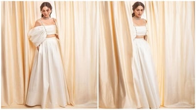 On Friday, Aditi gave her fans a weekend treat as the actress took to Instagram and uploaded a series of stunning pictures accompanied by a white heart emoji as the caption. In the post, she can be seen looking like an elegant princess in a crop top and matching skirt, giving off chic vibes. (Instagram/@aditiraohydari) On Friday, Aditi gave her fans a weekend treat as the actress took to Instagram and uploaded a series of stunning pictures accompanied by a white heart emoji as the caption. In the post, she can be seen looking like an elegant princess in a crop top and matching skirt, giving off chic vibes. (Instagram/@aditiraohydari)