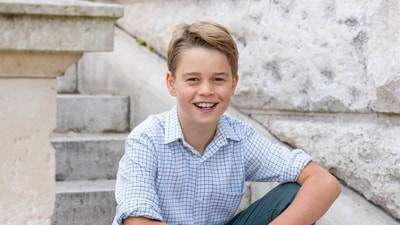 Kate Middleton and Prince William's eldest son Prince George violated the royal rule by donning a robe to meet heads of state. (Reuters)