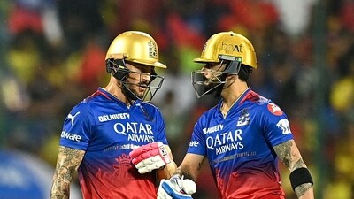 RCB were put to bat first after CSK won the toss. Their innings was briefly interrupted by rain after three overs, at which point VIrat Kohli and Faf du Plessis had put up an opening stand of 31 runs. That increased to 78 off 58 balls despite CSK exploiting the conditions by throwing spinners at the pair after resumption. The opening stand ended with Kohli falling on 47 off 29 balls. (AFP) RCB were put to bat first after CSK won the toss. Their innings was briefly interrupted by rain after three overs, at which point VIrat Kohli and Faf du Plessis had put up an opening stand of 31 runs. That increased to 78 off 58 balls despite CSK exploiting the conditions by throwing spinners at the pair after resumption. The opening stand ended with Kohli falling on 47 off 29 balls. (AFP)