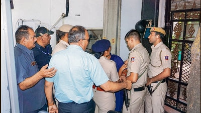 Delhi police officials outside the resident of chief minister Arvind Kejriwal on Saturday. (PTI) Delhi police officials outside the resident of chief minister Arvind Kejriwal on Saturday. (PTI)
