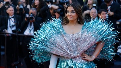 Aishwarya Rai poses on the red carpet during arrivals for the screening of the film Kinds of Kindness in competition at the 77th Cannes Film Festival in Cannes, France. (REUTERS)