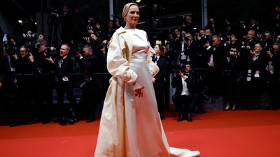 Uma Thurman rocked a gorgeous white satin gown. And with the chill in the air, she opted for a stunning cream jacket. With a side-swept bun, a soft make-up look and a pair of diamond earrings, she looked like a true beauty and her red carpet look deserves to be on the best-dressed list. (REUTERS/Stephane Mahe)