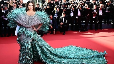 Indian beauty Aishwarya Rai grabbed the eyeballs with her gorgeous two-tone sequined gown. Designed by Falguni Shane Peacock, her red-carpet gown features a shimmering silver fabric with larger-than-life tortoise accents that scream drama. (AFP) Indian beauty Aishwarya Rai grabbed the eyeballs with her gorgeous two-tone sequined gown. Designed by Falguni Shane Peacock, her red-carpet gown features a shimmering silver fabric with larger-than-life tortoise accents that scream drama. (AFP)