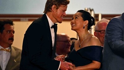 US actor Jesse Plemons (L) and US actress Hong Chau react after the screening of the film. In early reviews, the Guardian called it a "macabre, absurdist triptych", while Variety called it a "quizzical concoction bound to baffle and delight". (AFP) US actor Jesse Plemons (L) and US actress Hong Chau react after the screening of the film. In early reviews, the Guardian called it a "macabre, absurdist triptych", while Variety called it a "quizzical concoction bound to baffle and delight". (AFP)
