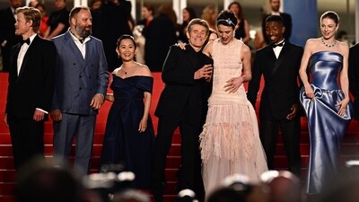 Jesse Plemons, Yorgos Lanthimos, Hong Chau, Willem Dafoe, Margaret Qualley, Mamoudou Athie and Hunter Schafer arrive for the screening. "I thought it was funny and Emma thought it was funny, but we didn't know if people are going to find it funny," Lanthimos said before the premiere. (AFP) Jesse Plemons, Yorgos Lanthimos, Hong Chau, Willem Dafoe, Margaret Qualley, Mamoudou Athie and Hunter Schafer arrive for the screening. "I thought it was funny and Emma thought it was funny, but we didn't know if people are going to find it funny," Lanthimos said before the premiere. (AFP)
