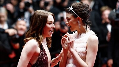 Emma Stone (L) reacts next to Margaret Qualley after the screening of the film Kinds of Kindness at the 77th edition of the Cannes Film Festival in Cannes. It is dubbed yet another hilarious and freaky film that marks the third collaboration between Emma and director Yorgos Lanthimos after Poor Things and The Favourite. (AFP) Emma Stone (L) reacts next to Margaret Qualley after the screening of the film Kinds of Kindness at the 77th edition of the Cannes Film Festival in Cannes. It is dubbed yet another hilarious and freaky film that marks the third collaboration between Emma and director Yorgos Lanthimos after Poor Things and The Favourite. (AFP)