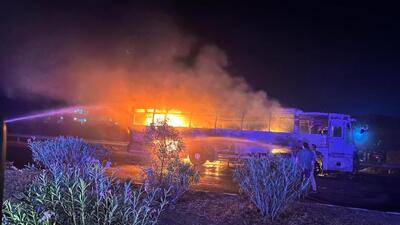 Firefighters fight the blaze in the sleeper bus on the KMP Expressway on Saturday. (HT Photo) Firefighters fight the blaze in the sleeper bus on the KMP Expressway on Saturday. (HT Photo)