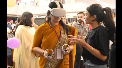General observer Divya Mittal taking demonstration of India's first metaverse powered virtual model polling booth in Ludhiana on Saturday. (HT Photo) General observer Divya Mittal taking demonstration of India's first metaverse powered virtual model polling booth in Ludhiana on Saturday. (HT Photo)