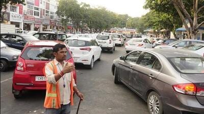 It was noticed that another parking attendant, Uttam, deputed at the exit point of the market was allowing the vehicles without checking the parking slips. (HT File Photo/for representation only)