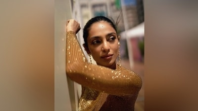 Cannes 2024: Meanwhile, Sobhita styled her long tresses in a sleek braided bun. Lastly, she chose feathered brows, gold bead adornments for eye makeup, shimmering gold eye shadow, mascara on the lashes, beaming highlighter, caramel lip shade, rouge on the cheekbones, and beaming highlighter for the glam picks. (Instagram) Cannes 2024: Meanwhile, Sobhita styled her long tresses in a sleek braided bun. Lastly, she chose feathered brows, gold bead adornments for eye makeup, shimmering gold eye shadow, mascara on the lashes, beaming highlighter, caramel lip shade, rouge on the cheekbones, and beaming highlighter for the glam picks. (Instagram)