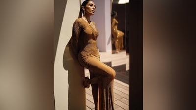 Cannes 2024: Sobhita slipped into a golden bodycon gown for her second look at the Cannes Film Festival. She shared pictures of her look on Instagram with the caption, "Pranced about like a gilded dragon at the @magnum lounge in Cannes." The ensemble she wore is from the Indian clothing label Itrh. (Instagram) Cannes 2024: Sobhita slipped into a golden bodycon gown for her second look at the Cannes Film Festival. She shared pictures of her look on Instagram with the caption, "Pranced about like a gilded dragon at the @magnum lounge in Cannes." The ensemble she wore is from the Indian clothing label Itrh. (Instagram)